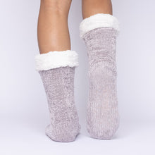 Load image into Gallery viewer, The Foozie™ in Light Gray, back view with one foot raised to show the non-slip grips on the sole