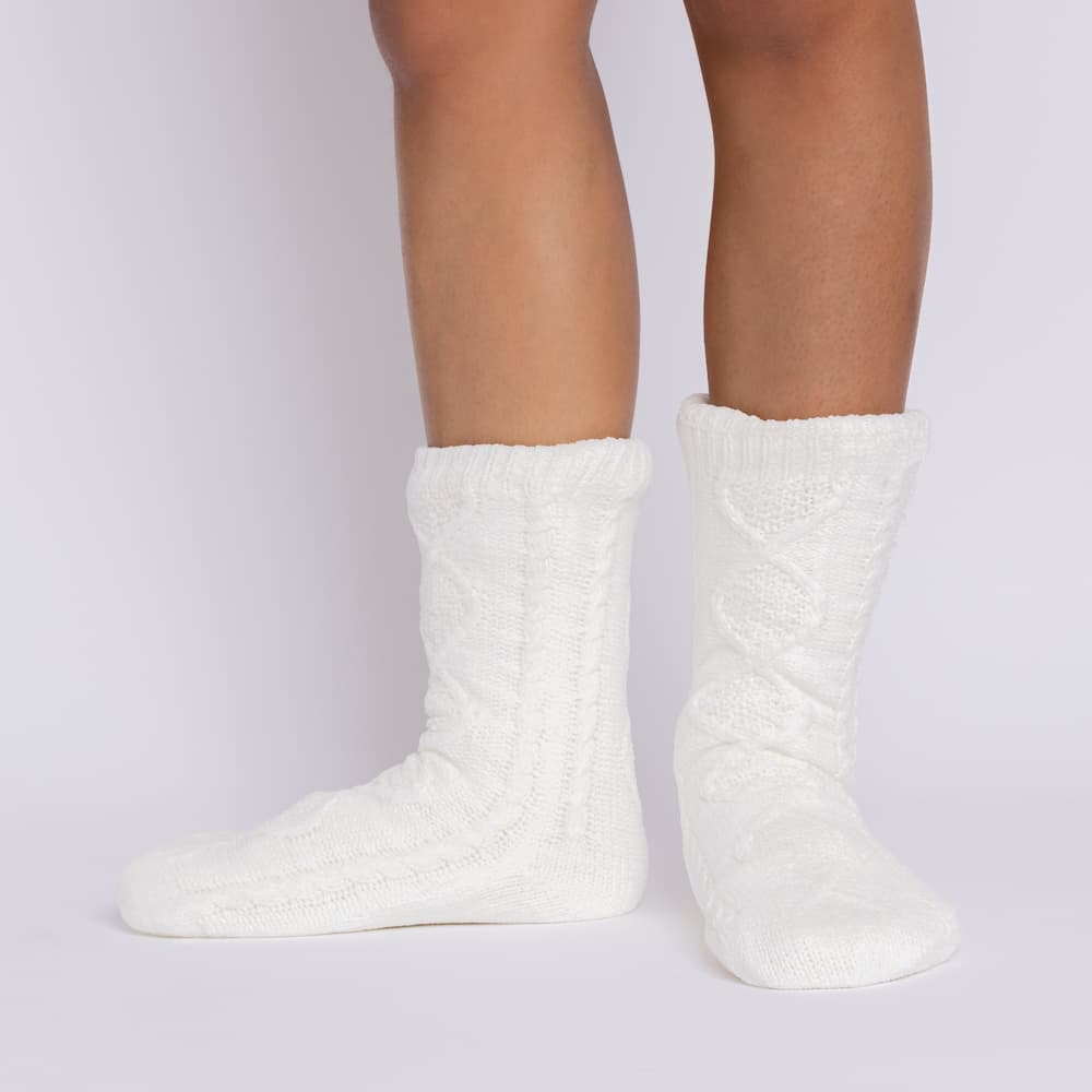 The Foozie™ Move in White, front view of both feet showing the diamond cable knit