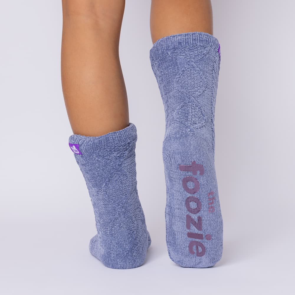 The Foozie™ Move in Blue, back view showing the diamond cable knit and the foozie grips on the sole