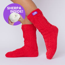 Load image into Gallery viewer, The Foozie™ Move in Red, side view on foot with a 'Sherpa inside' badge showing the lining
