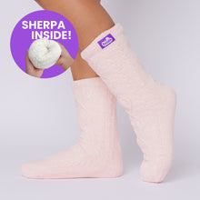 Load image into Gallery viewer, The Foozie™ Move in Pink, side view on foot with a 'Sherpa inside' badge showing the lining
