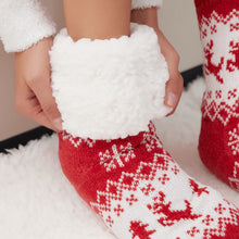 Load image into Gallery viewer, The Foozie™ Christmas Reindeer slipper socks, close-up of hands holding the thick sherpa cuff open
