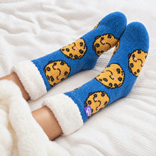 Load image into Gallery viewer, The Foozie™ Cookie slipper socks, under a blanket
