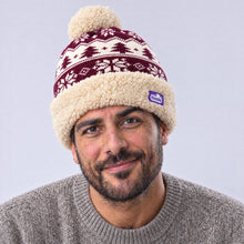 Load image into Gallery viewer, The Foozie™ Nordic Christmas Beanie, worn by a man
