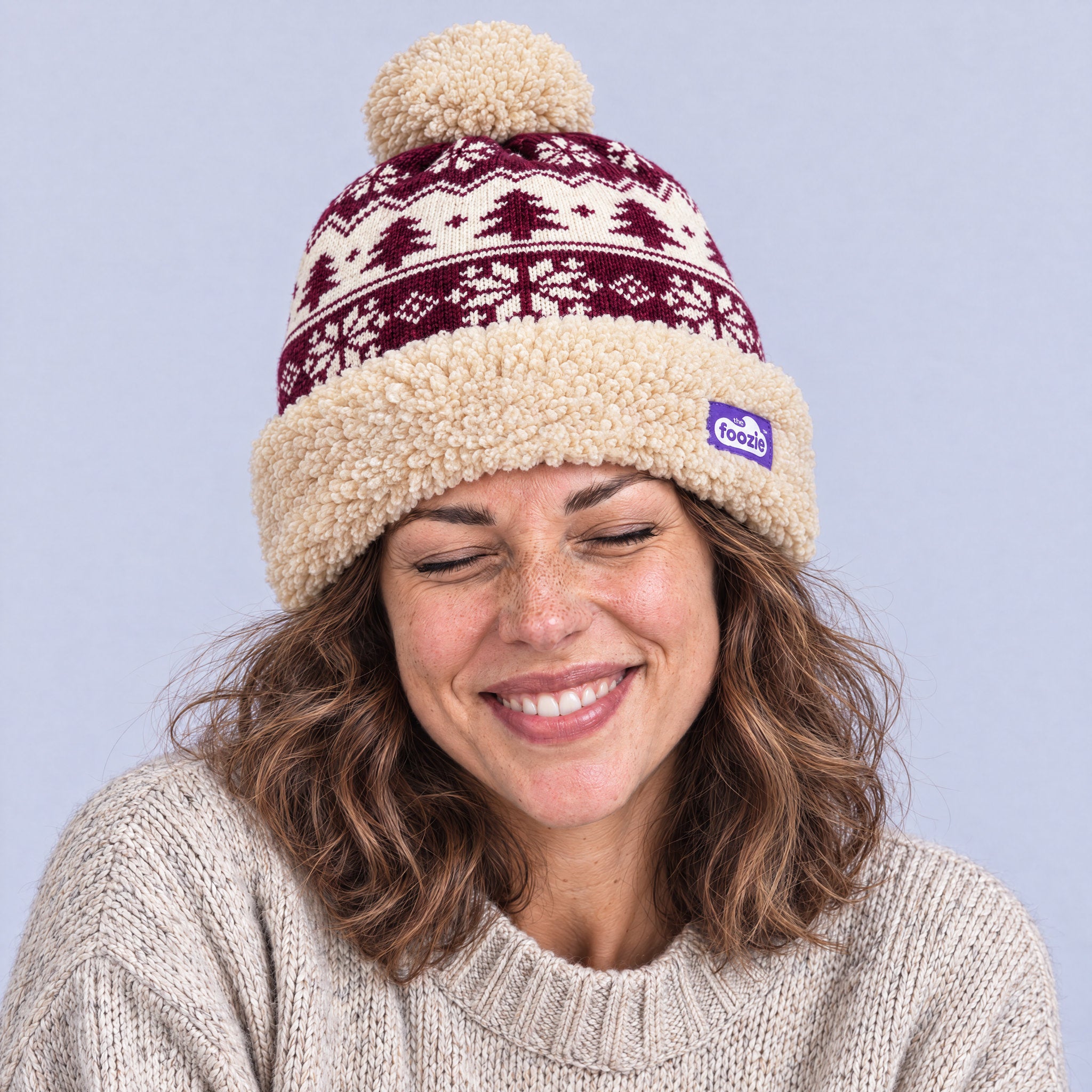 The Foozie™ Nordic Christmas Beanie, worn by a woman