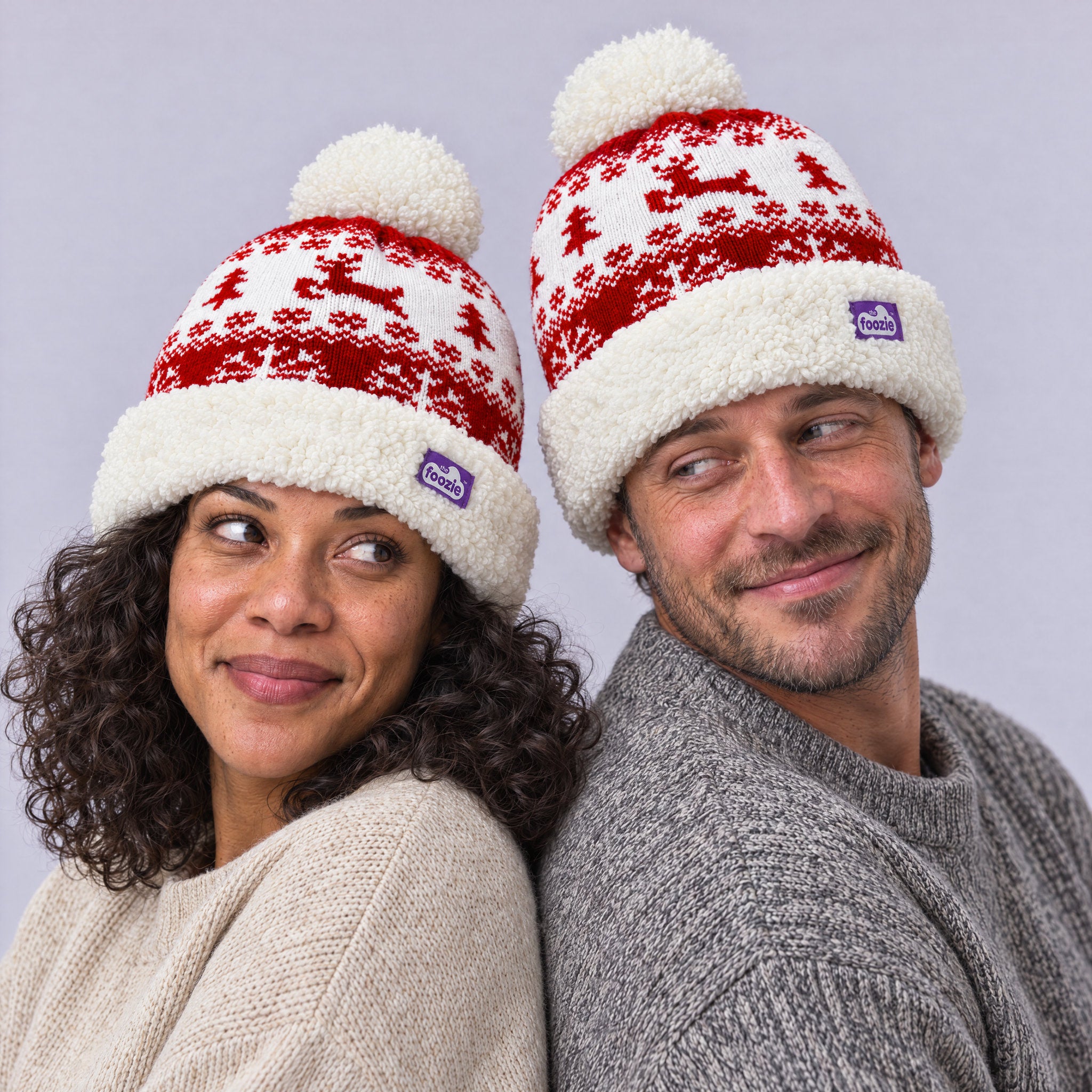The Foozie™ Reindeer Christmas Beanie, worn by a couple