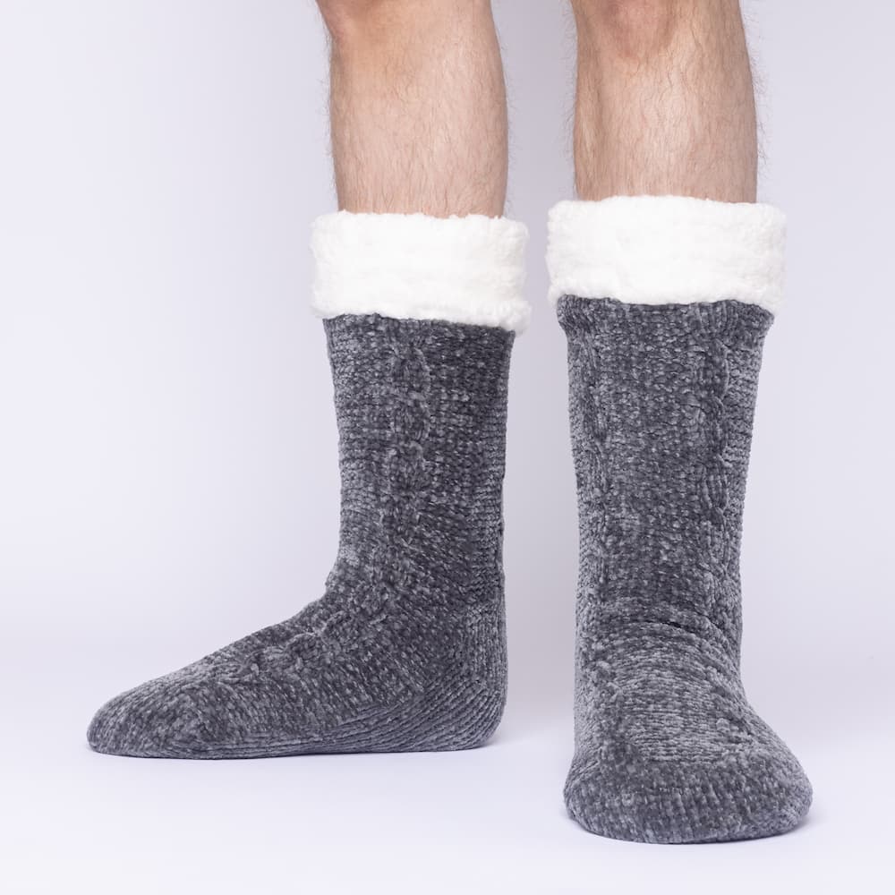 The Foozie™ in Dark Gray, front view of both feet worn by a man in Large with the sherpa cuffs folded down