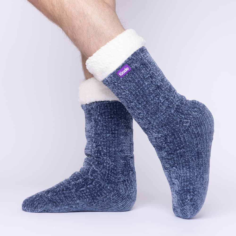The Foozie™ in Blue, side view worn by a man in Large with the sherpa cuff folded down