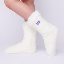 Load image into Gallery viewer, The Foozie™ in White, side view worn in Kids/Small with the sherpa cuff folded down
